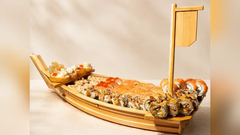 Party Platter — Philadelphia Classic, Philadelphia Eel, Philadelphia Ebi, Banzai, Vulcano, Hot Unagi, Canada, Philadelphia Eel, Ikura, Yellow Dragon, Eel Hosomaki, Inari Ikura Nigiri (4pcs)