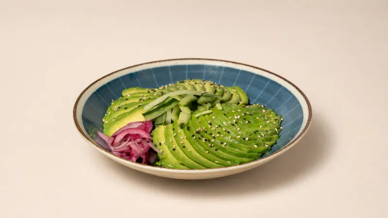 Avocado Salad — Avocado, mixed salad, pickled onion, red cabbage, sesame, cucumber and onion dressing