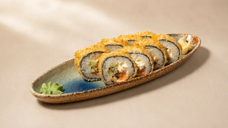 Banzai hot roll — Philadelphia, eel, salmon, cucumber, tempura, panko breadcrumbs, seaweed, rice