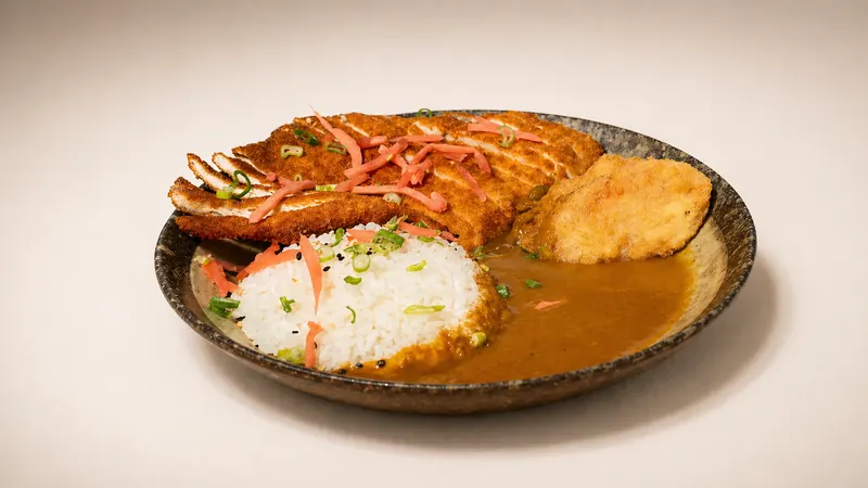Chicken Katsu Curry — Breaded chicken with vegetable and Japanese curry sauce, rice, sesame