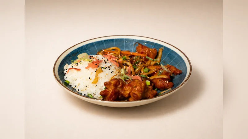 Dynamit Chicken — Marinated chicken, vegetables, Korean spices, chilli, sesame