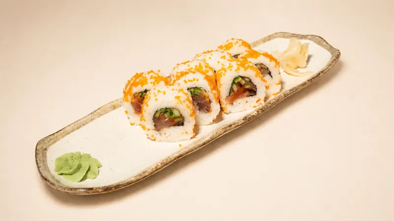 Spicy Tuna — Tuna, spicy mayo, cucumber, tobiko, seaweed, rice